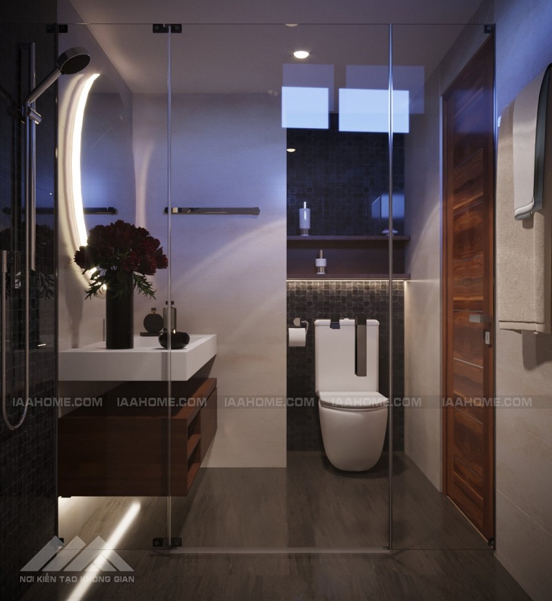 Phòng tắm sử dụng kính và gương cùng với đèn trùng tone với phong ngủ tạo ra sự liên kết xuyên suốt cho không gian